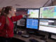 Dispatcher Sara Shover shows the console at South Metro Fire Rescue's 911 Communications Center