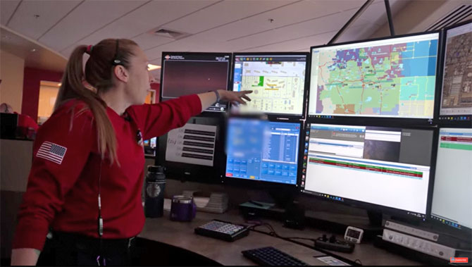 Dispatcher Sara Shover shows the console at South Metro Fire Rescue's 911 Communications Center